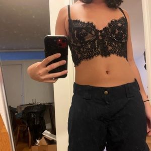 Black lace corset with double clasping back